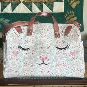 Under One Sky bag